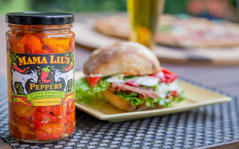 Mama Lil's Pickled Peppers and Fine Condiments  - Gourmet, Sweet, Hot and Mildly Spicy Pickled Peppers, Bread and Butter Pickle and Pepper Relish, Peppa Lilli Mustard, Pickled Asparagus and Green Beans For Sale Online.  Product of the USA - Retail and Wholesale - Domestic and International Shipping Available